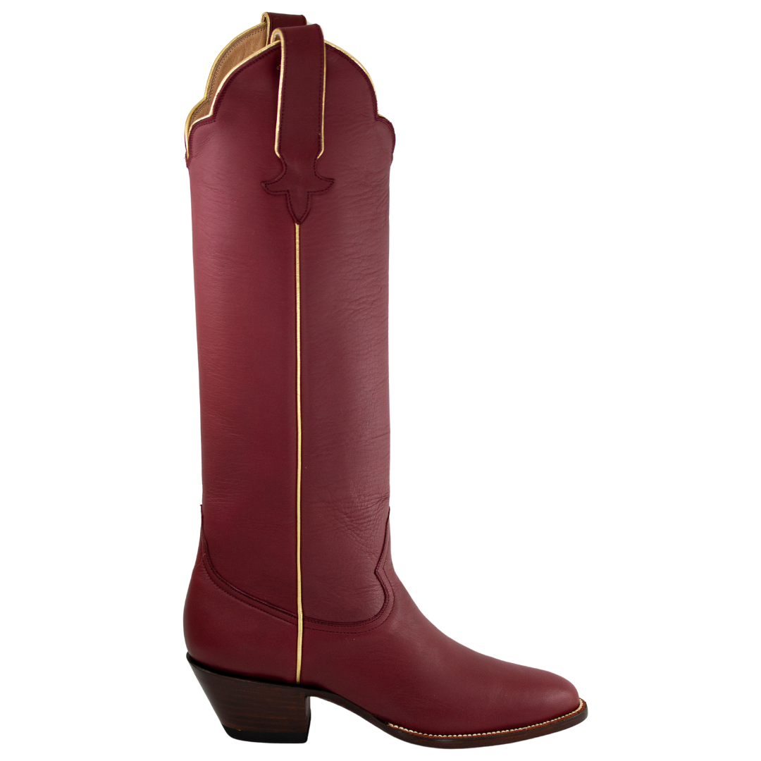 Side view of the Maroon and Gold McCall boot with gold piping and a dark stacked heel.