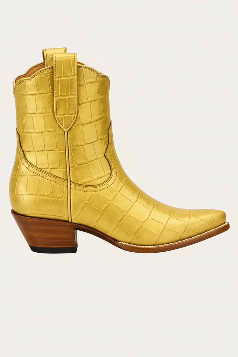 Gold American Alligator cowgirl cowboy boot with a crocodile pattern on a white background