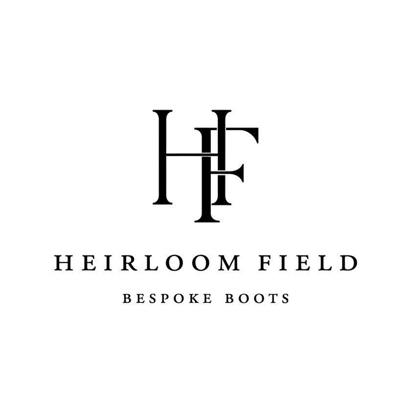Heirloom Field logo with black text on a white background