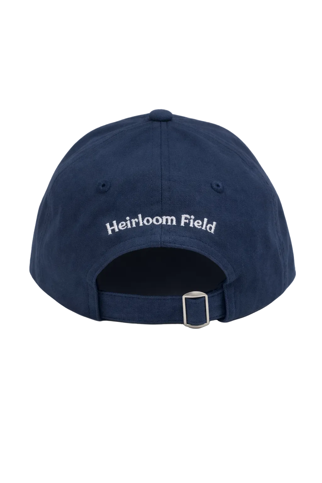 Back of the navy Heirloom Field cap, showing white embroidery and an adjustable strap with a metal buckle.