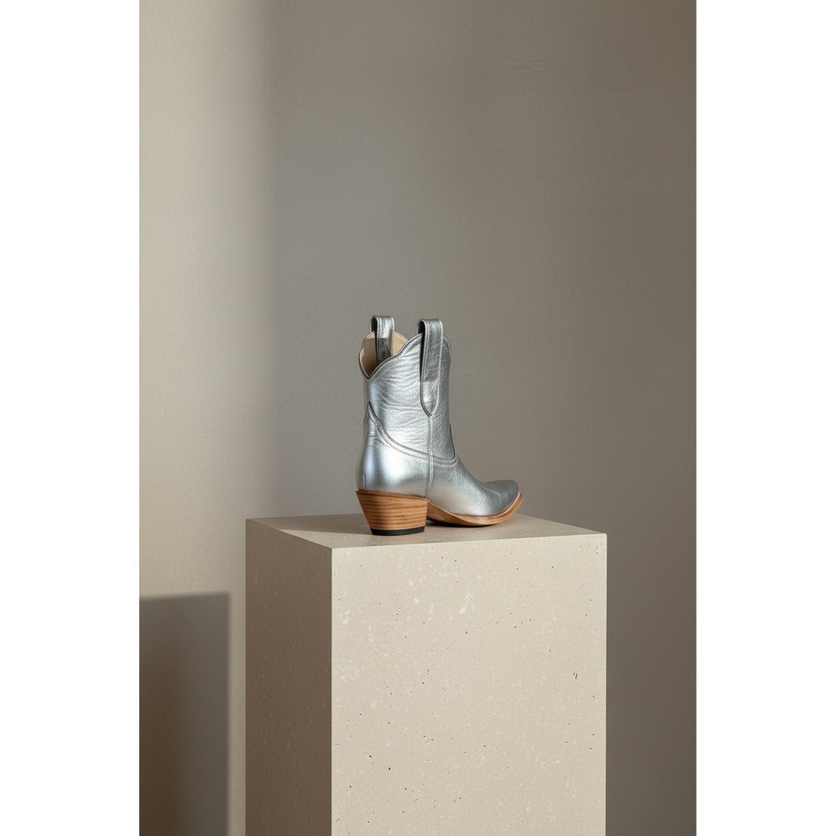 The Payton Boot — Silver Metallic — Detail view of premium calfskin texture and tonal stitching