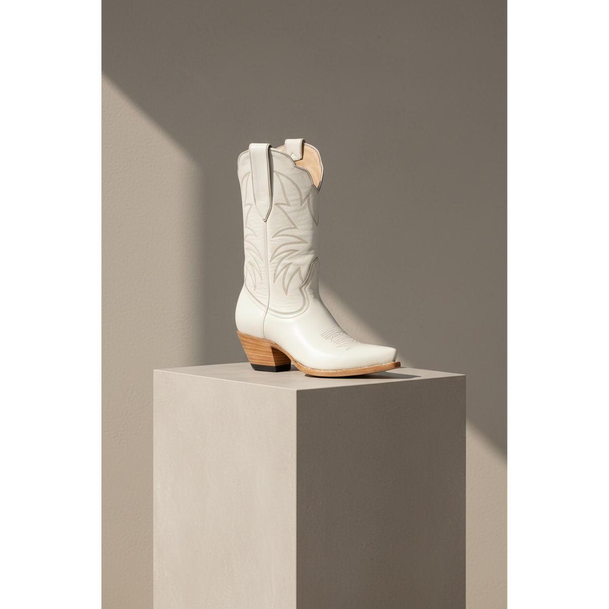 The Taylor Midi Boot — Heritage Palette — Side profile showing architectural silhouette and stacked leather heel