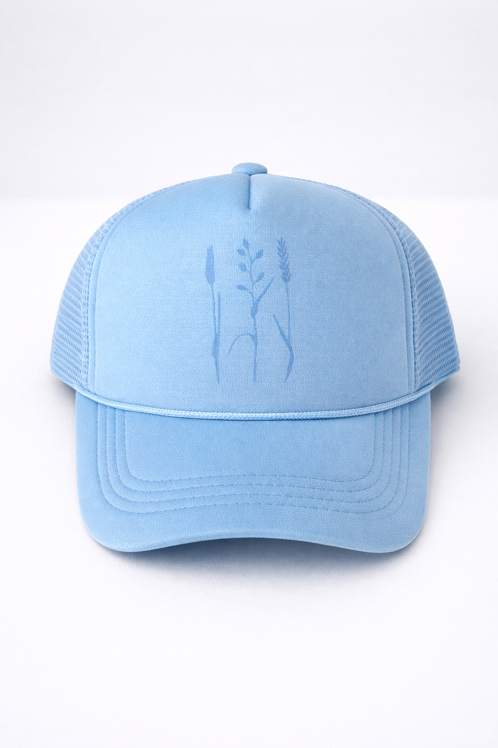 Light blue cap with embroidered design on a white background