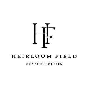Heirloom Field logo with black text on a white background