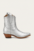 Silver crocodile-patterned cowboy boot with a brown heel on a white background