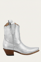 Silver cowboy boot with brown heel and sole on a white background