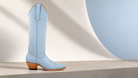 Powder Blue Vine | Wide fashion campaign. AI-generated editorial image.