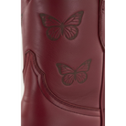 Close-up of butterfly details and stitching on a maroon Mariposa boot.