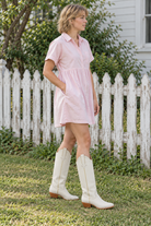 McCall Bone pale pink college outfit. AI-generated editorial image.