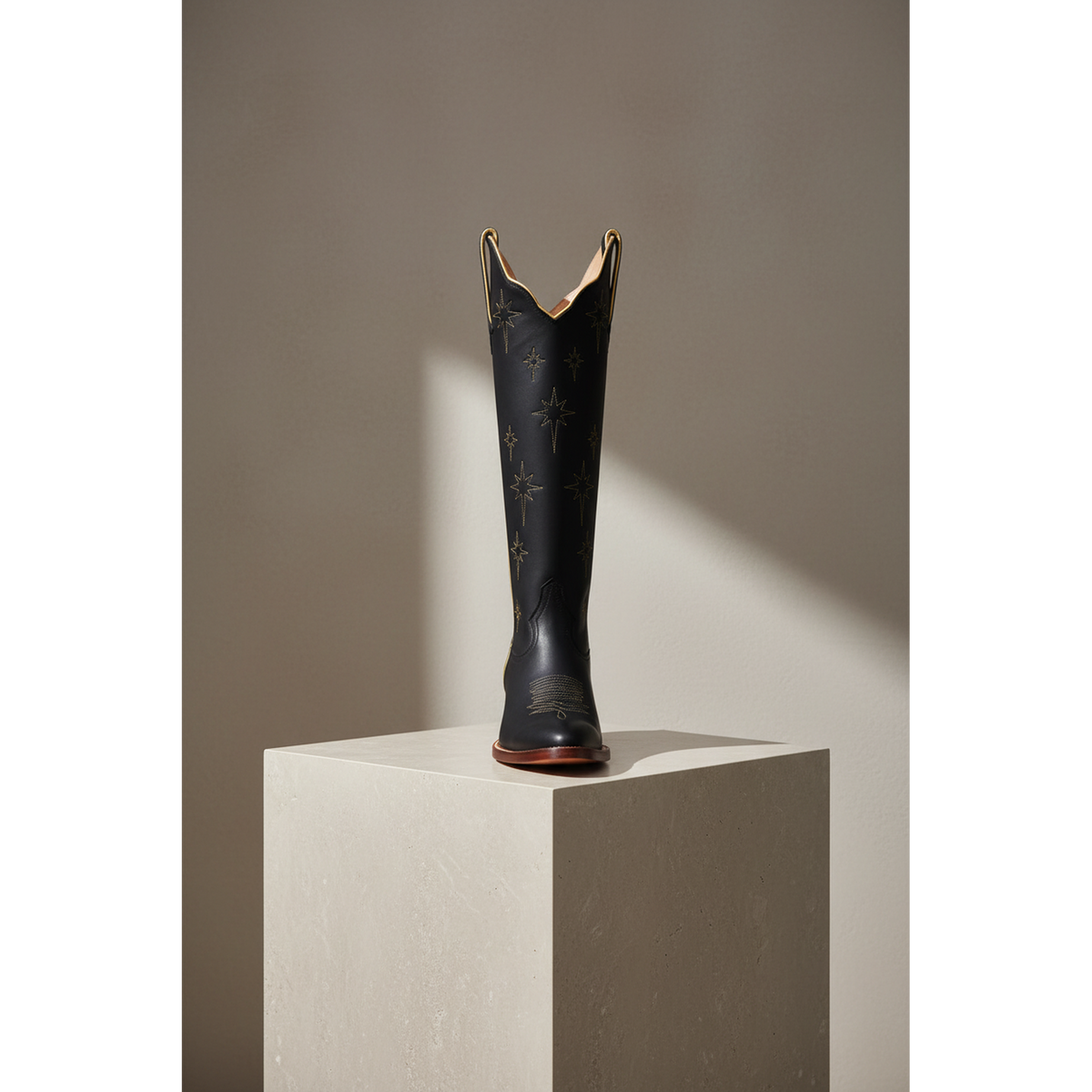 The North Star Boot — Side profile showing architectural silhouette and stacked leather heel