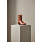 The Payton Boot — Two-Tone Chestnut — Side profile showing architectural silhouette and stacked leather heel
