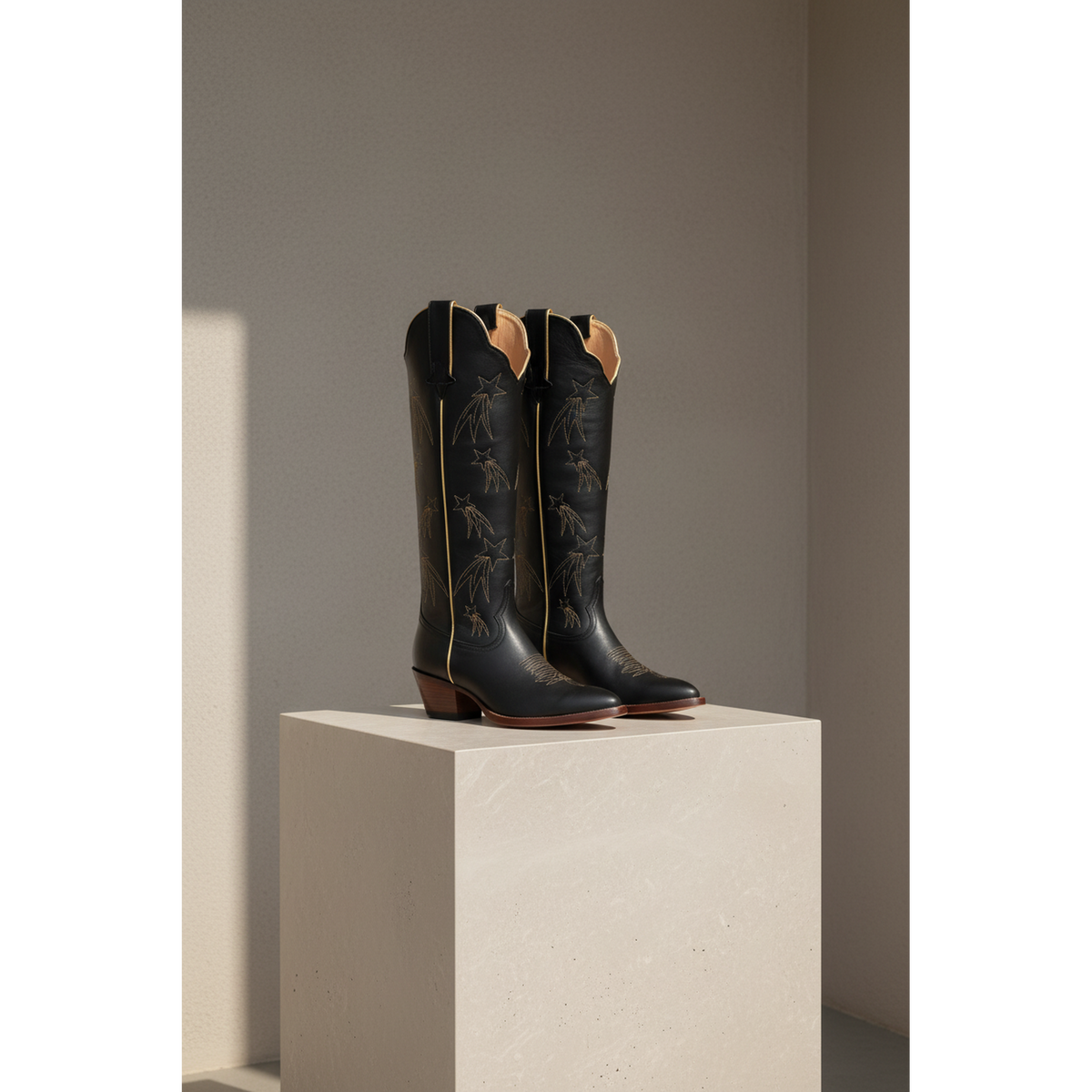 The Shooting Star Boot — Side profile showing architectural silhouette and stacked leather heel