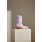 The Taylor Midi Boot — Spring Palette — Detail view of premium calfskin texture and tonal stitching