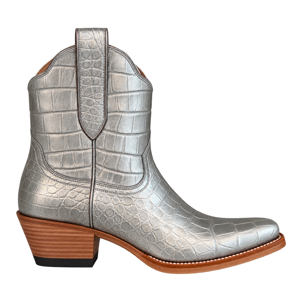 Silver Alligator Payton boot in side profile, with silver scale texture and a brown stacked heel.